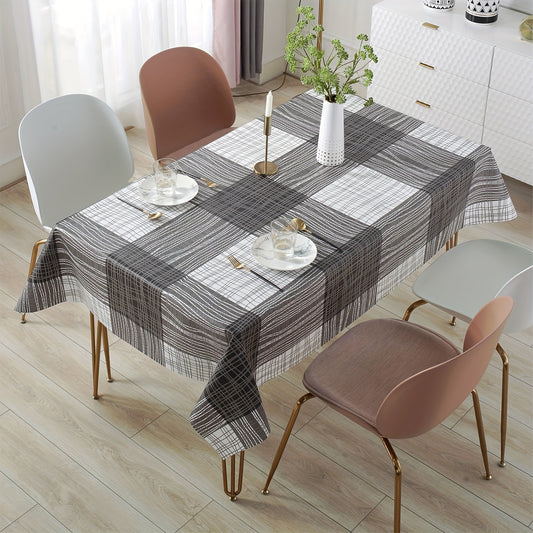 Rectangular PVC tablecloth with chic plaid design, waterproof and heat-resistant for easy cleaning and durability. Made from 100% PVC material.