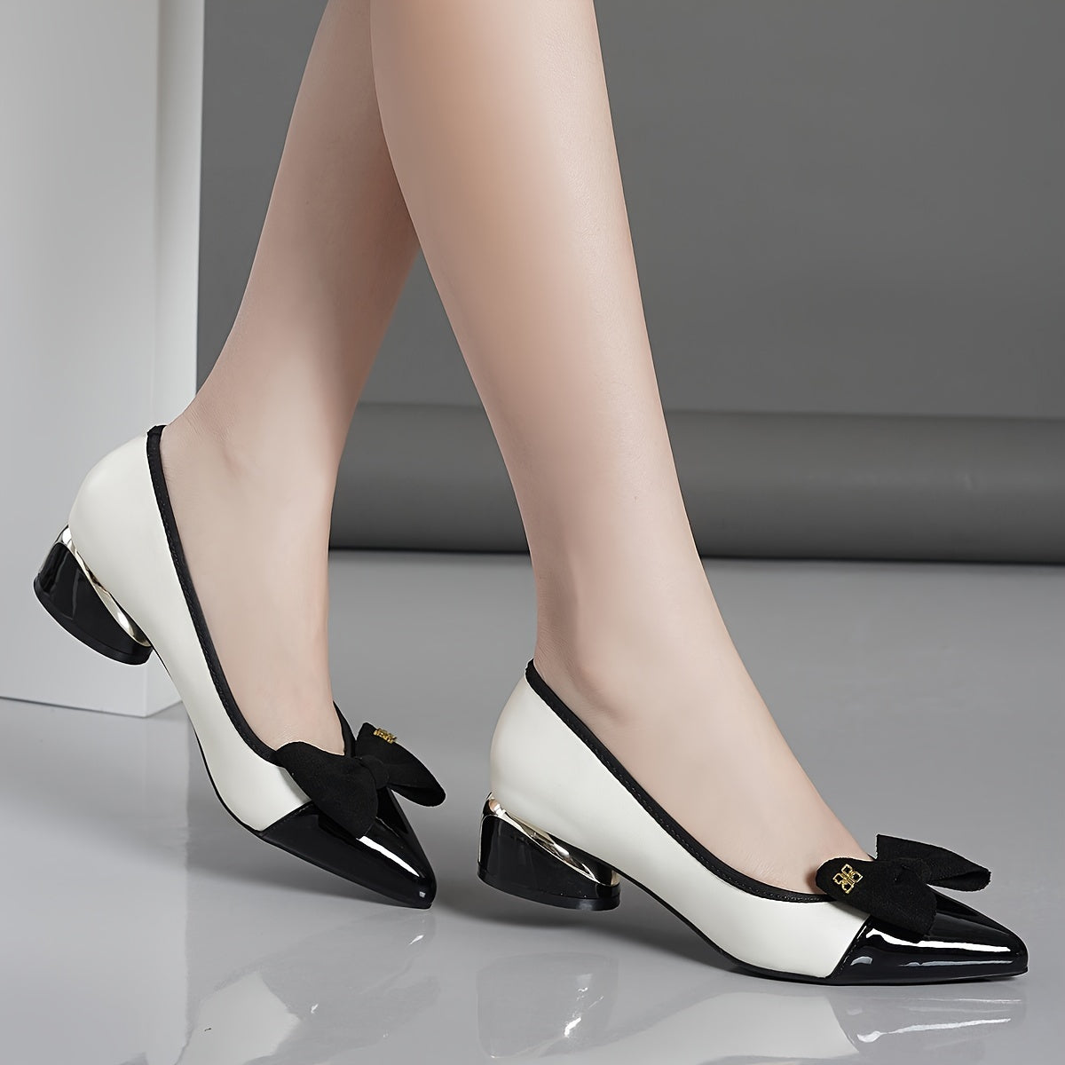 Chunky heels with bowknot decor and point toe, slip on style for stylish dress pumps.