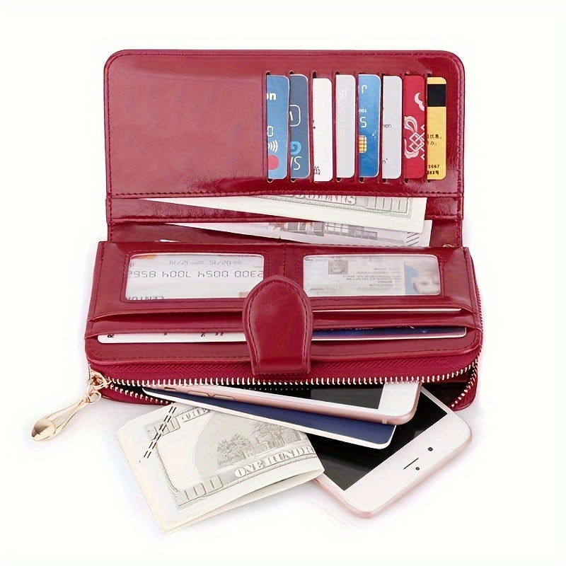 Red synthetic leather wallet with wrist strap, large capacity for cards, zipper closure, polyester lining - ideal for everyday use, contemporary and durable.