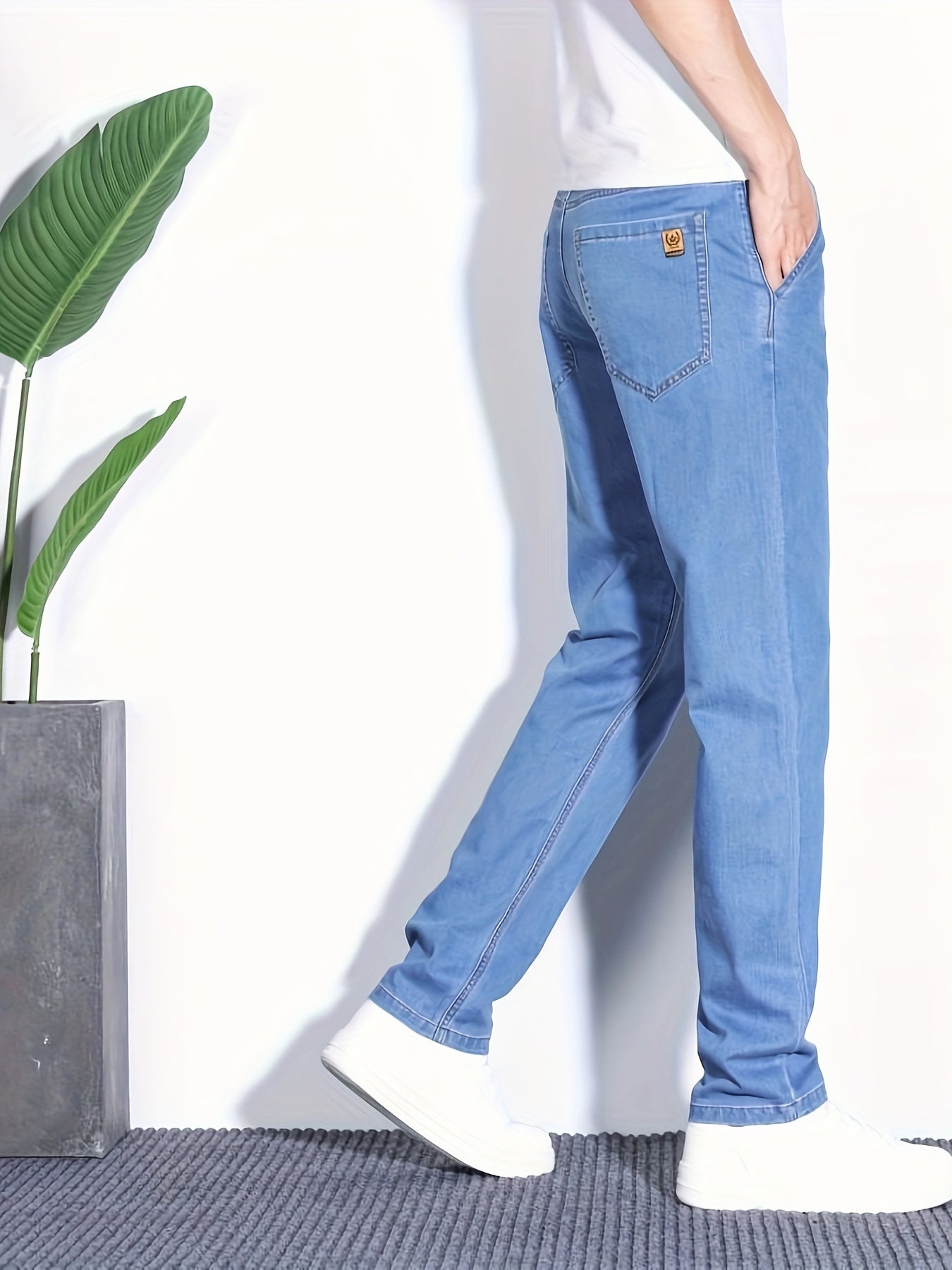 Summer jeans for men, regular fit with breathable lightweight denim and pockets.