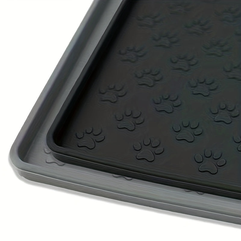 Silicone pet food mat with raised edge.