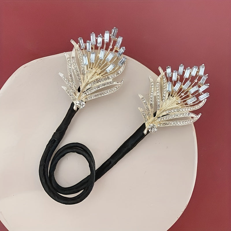 Feathered twist hair clip adorned with rhinestones