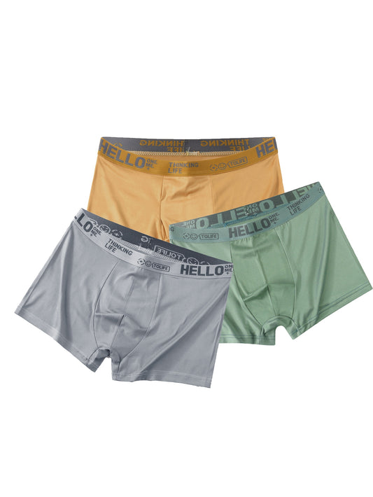 Men's solid color boxer briefs in sizes S-XXL, perfect for spring and summer sports.