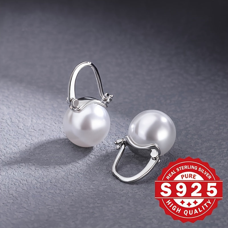 Elegantly crafted from S925 sterling silver, these stunning ladies' earrings feature arched shell pearls that exude exquisite charm. Perfect for wearing at banquets and weddings, this pair makes a great gift option as it is low in allergens and