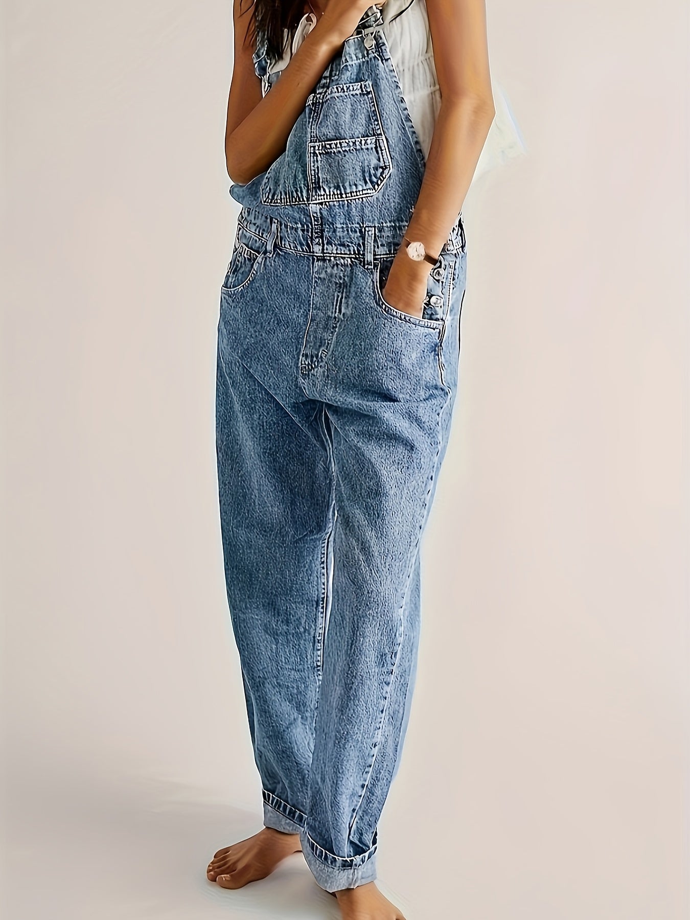 Casual solid color denim overalls for women, made of viscose and polyester blend fabric, strappy back design, no belt included, regular fit.