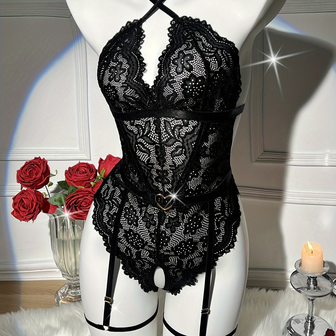 Floral lace lingerie set with open crotch, heart back teddy, garter belt, and sling design for women.