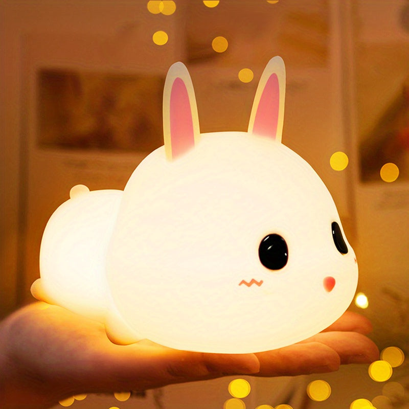 Adorable rabbit-shaped night light for bedroom, rechargeable and portable.