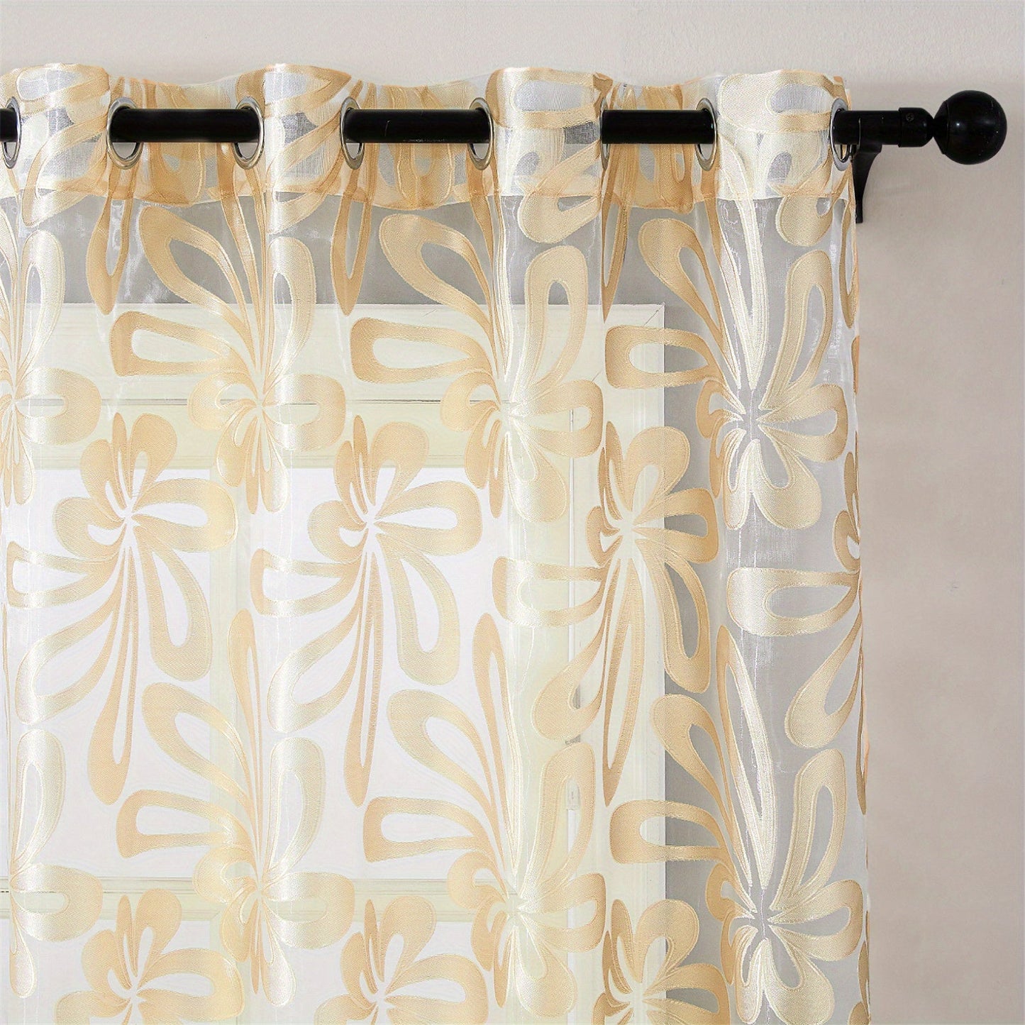 This Elegant Geometric Sheer Curtain Panel in Brown & White Floral Jacquard Design is made of lightweight polyester. It is machine washable and comes with eyelets for easy hanging. Ideal for enhancing the decor of your living room or bedroom.