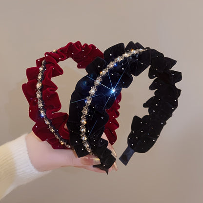 Black velvet headband with rhinestone embellishments, ideal for weddings and formal events.