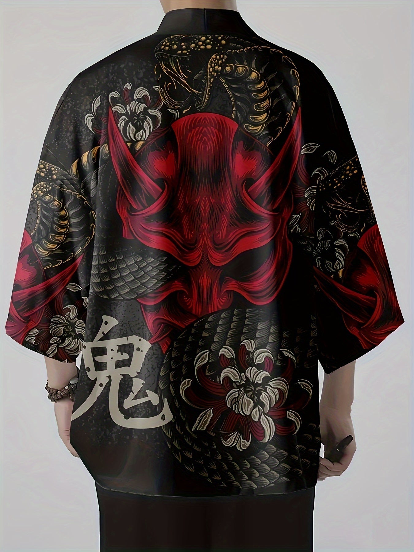 Japanese-style kimono shirt for men with ghost and snake illustration pattern, three-quarter sleeves, and open placket. Perfect for summer streetwear.