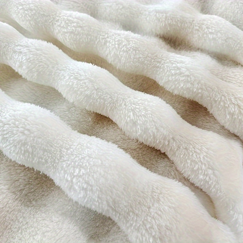 Soft and plush faux fur throw blanket for ultimate luxury and comfort. Perfect for cozying up on the couch or adding a touch of elegance to your bedroom or living room. Machine washable for easy care, suitable for all seasons. Measures 99.06x149.86cm.