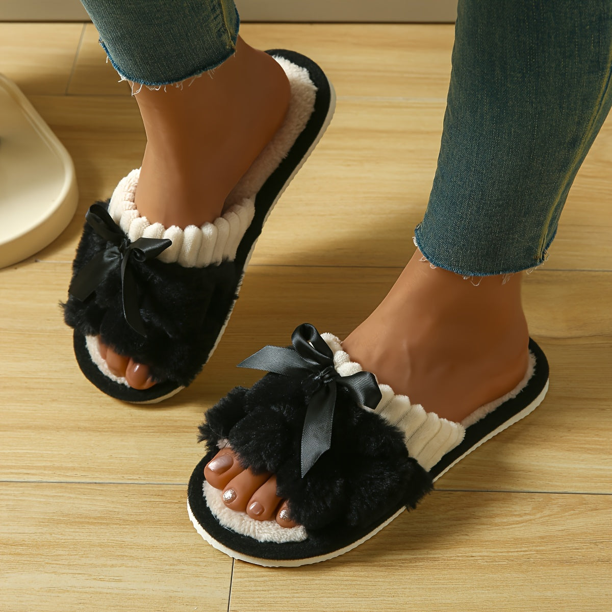 Cozy bowknot slippers with open toes for home comfort.