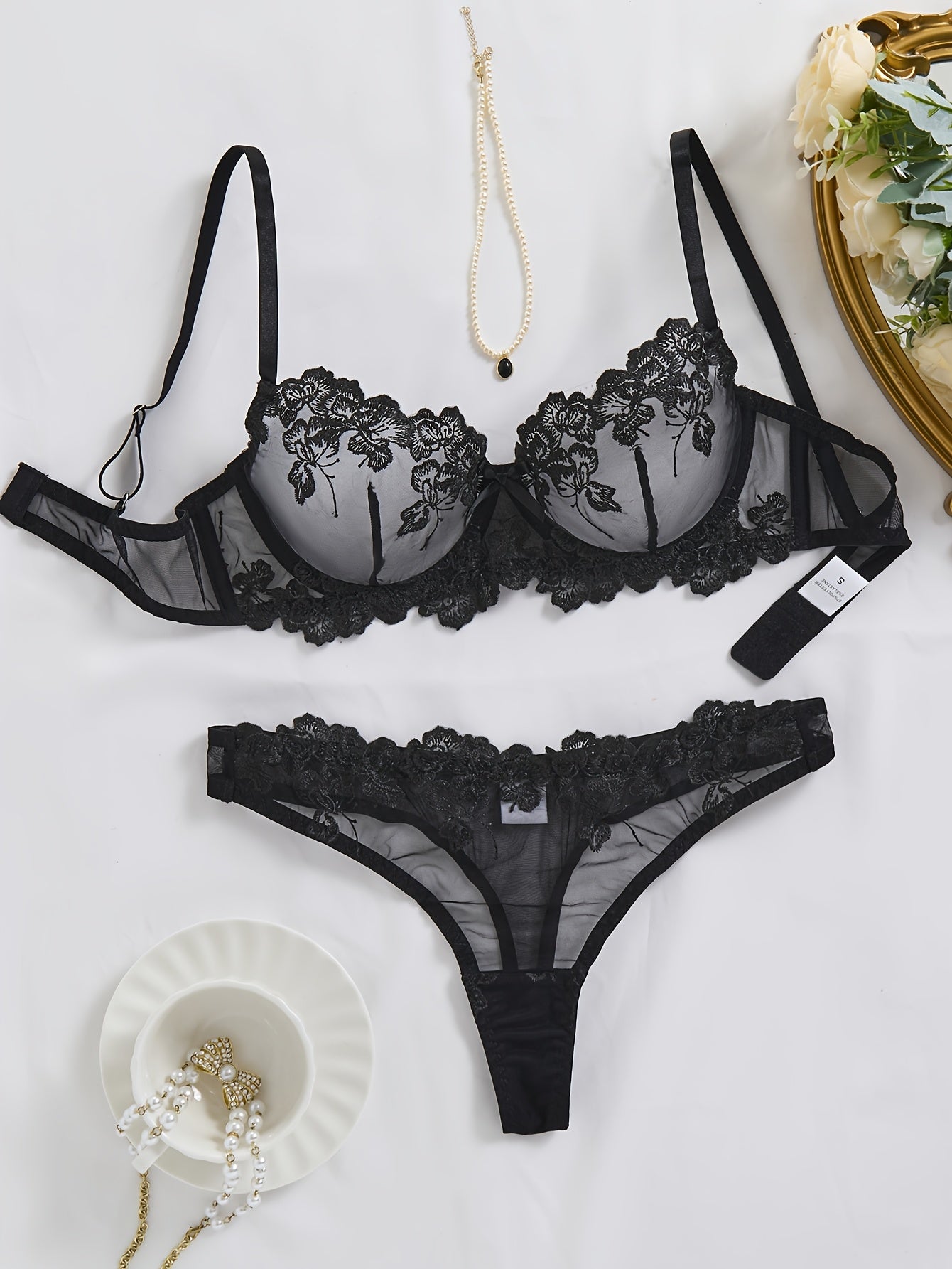 Elegant floral embroidered lingerie set for women, featuring medium support underwire bra and briefs in polyester knit fabric. No padding, drop waist design with a mature style - ideal