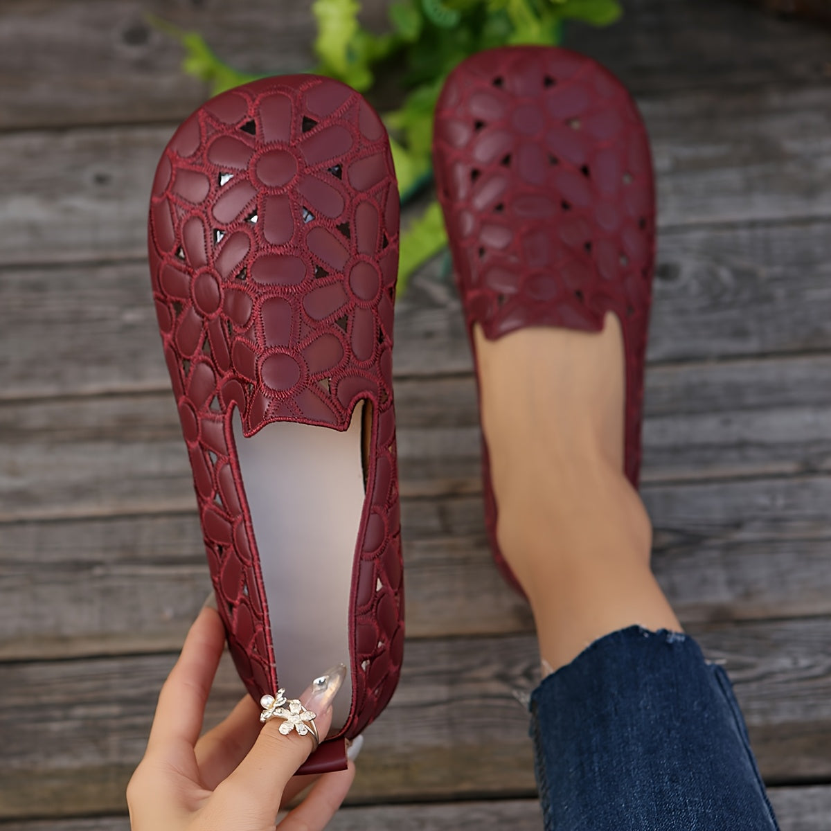 Stylish women's slip-on flats feature embroidered flowers, faux leather, breathable hollow design, and soft sole for year-round wear.