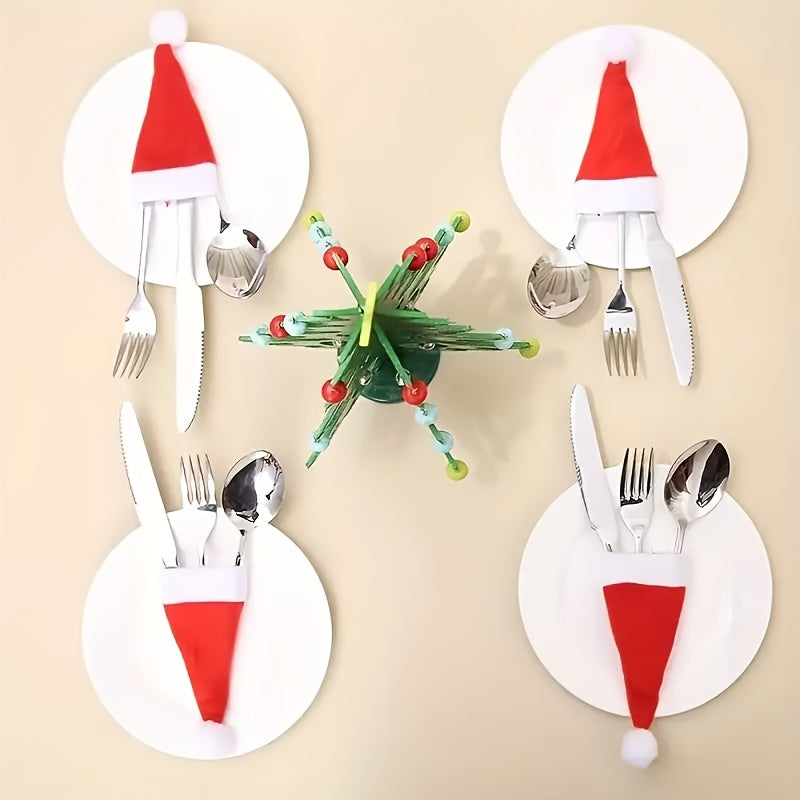 Set of 10 mini Christmas hat cutlery holders in red, ideal for holiday table decor and all-season dining.