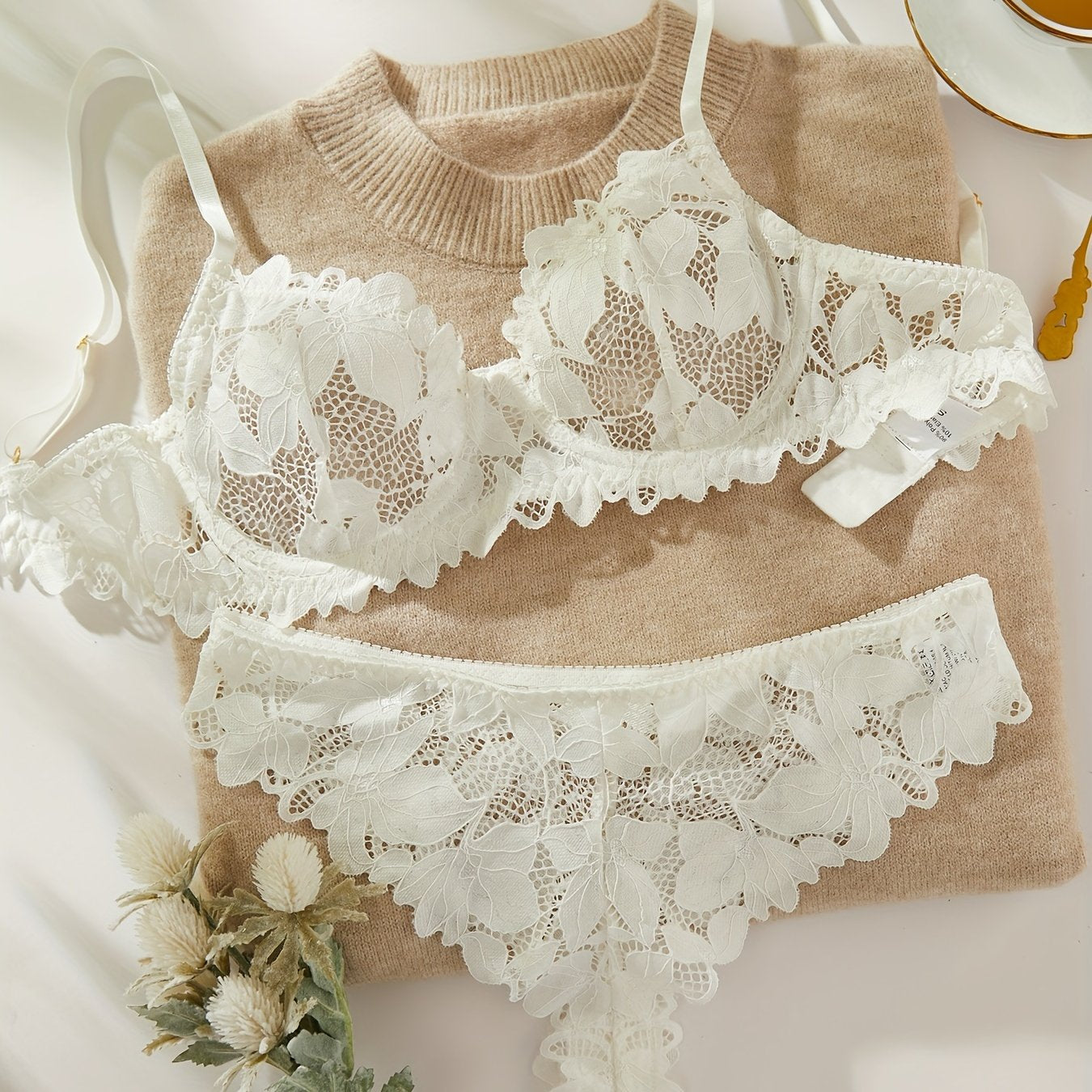 Floral lace lingerie set with unlined bra and panties for women.