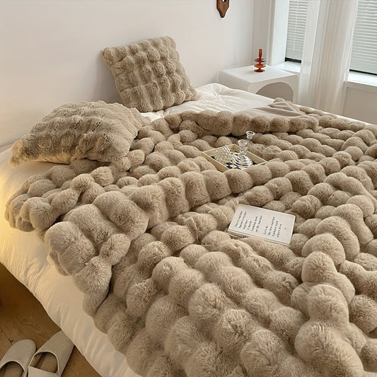 Soft and plush, this solid color blanket is perfect for snuggling up on the couch, in the office, or while camping and traveling. It's a versatile gift that can be used year-round.