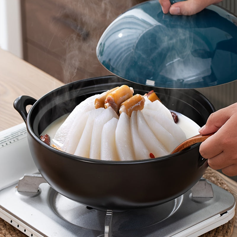 High-quality ceramic wok with emerald green lid, designed for high temperatures and non-stick cooking. This versatile stew pot is perfect for use on open flame gas burners, ideal for making soup or steaming dishes in your kitchen. A must-have addition to