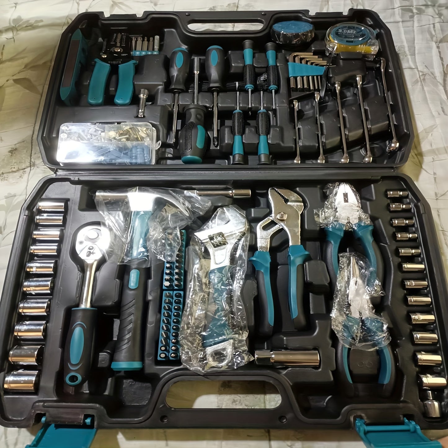 281-piece home tool kit with socket wrench, screwdriver, hex keys, pliers, and storage case. Perfect for DIY projects and gifts.