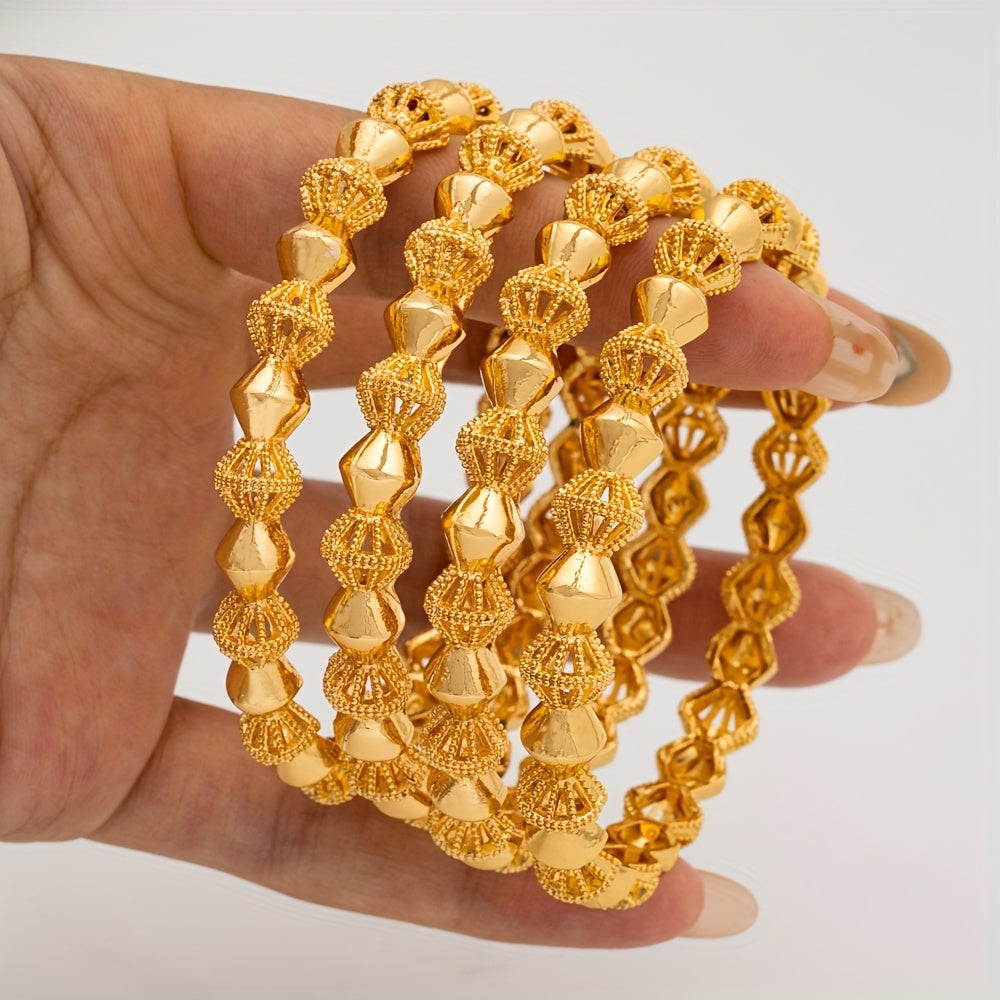 Two gold-tone alloy bangle bracelets that exude elegance and luxury fashion, inspired by Middle Eastern and African Nigerian styles. Perfect for weddings or daily wear, these versatile accessories are suitable for any season or occasion, including