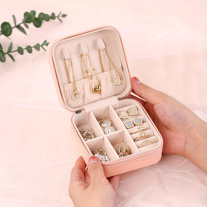 Travel-friendly jewelry organizer for rings, necklaces, and earrings.