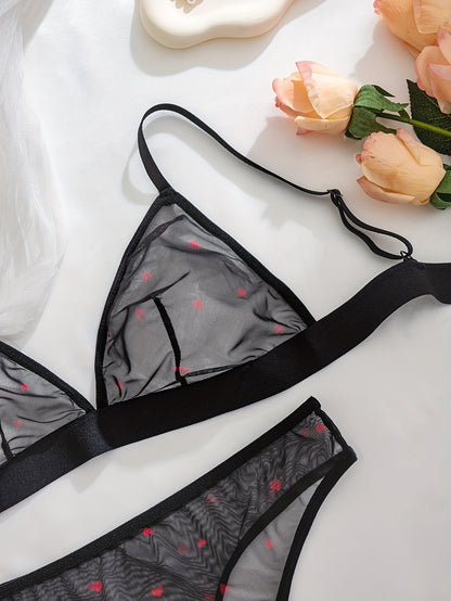 Sexy black sheer mesh lingerie set with red heart pattern, medium support, no underwire, drop waist, made of 90% polyester and 10% elastane.