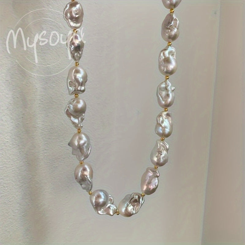 This elegant and unique baroque freshwater pearl necklace from MYSOYA Brand is the perfect accessory for any occasion. With pearls ranging from 14-23mm in size, this handmade boho necklace is a stunning choice for a party, wedding, anniversary, or as a