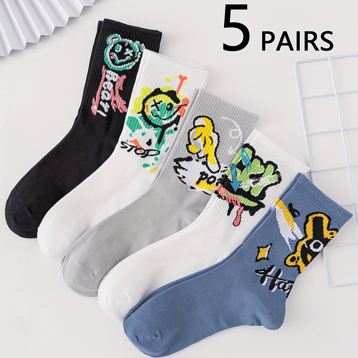 10 Pairs Men's Mid-Calf Socks - Stylish graffiti design, perfect for daily wear and outdoor activities. Made of a blend of polyester and spandex.