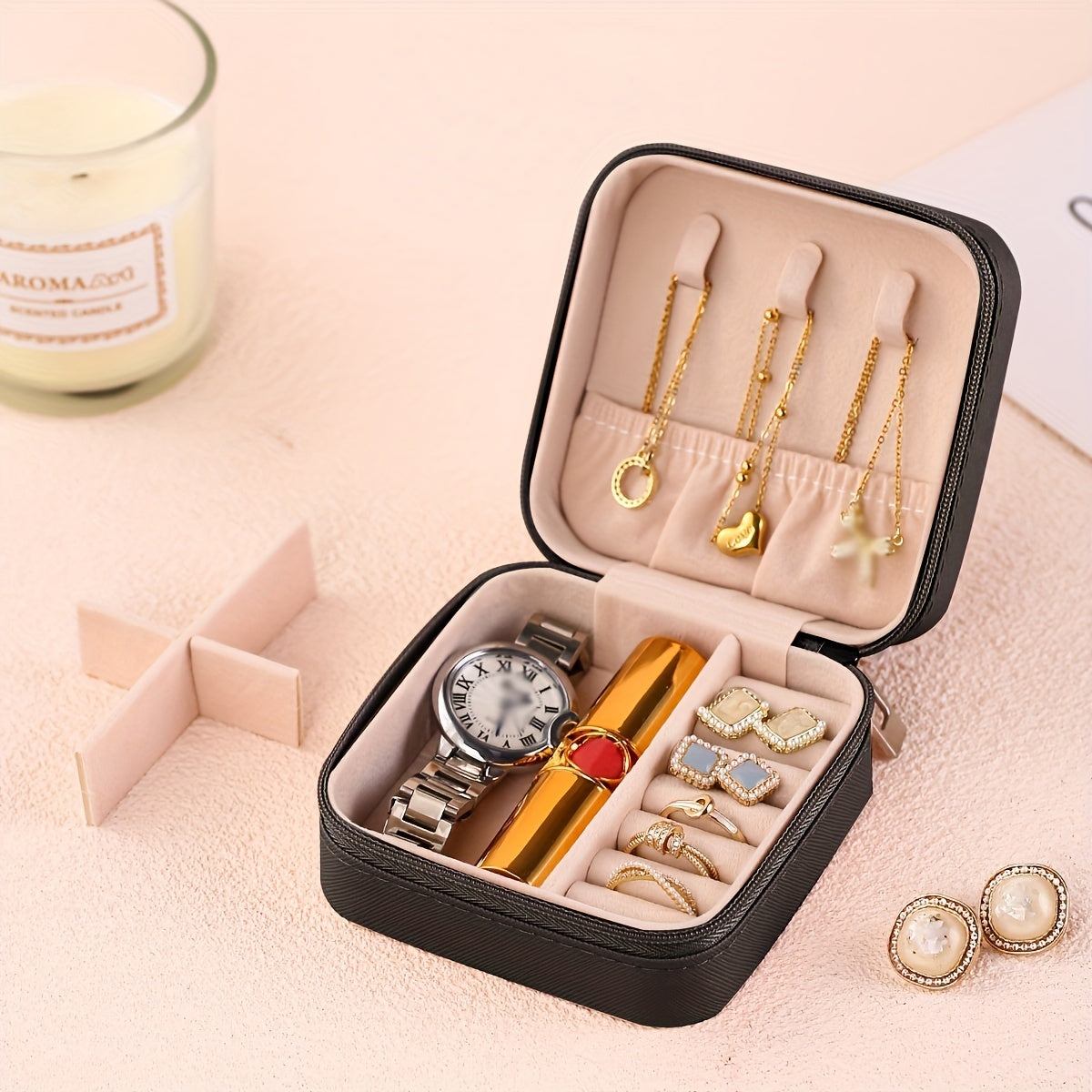 Portable jewelry storage box for traveling, suitable for earrings, necklaces, and rings. Simplistic organizer for jewelry.