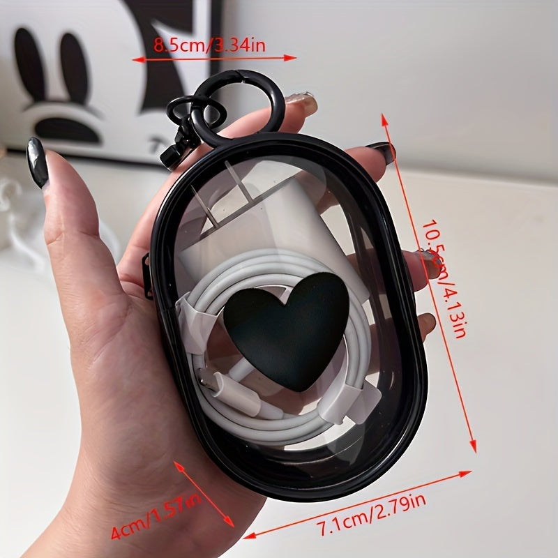 Waterproof heart-shaped PVC bag with keychain for organizing cables and headphones.