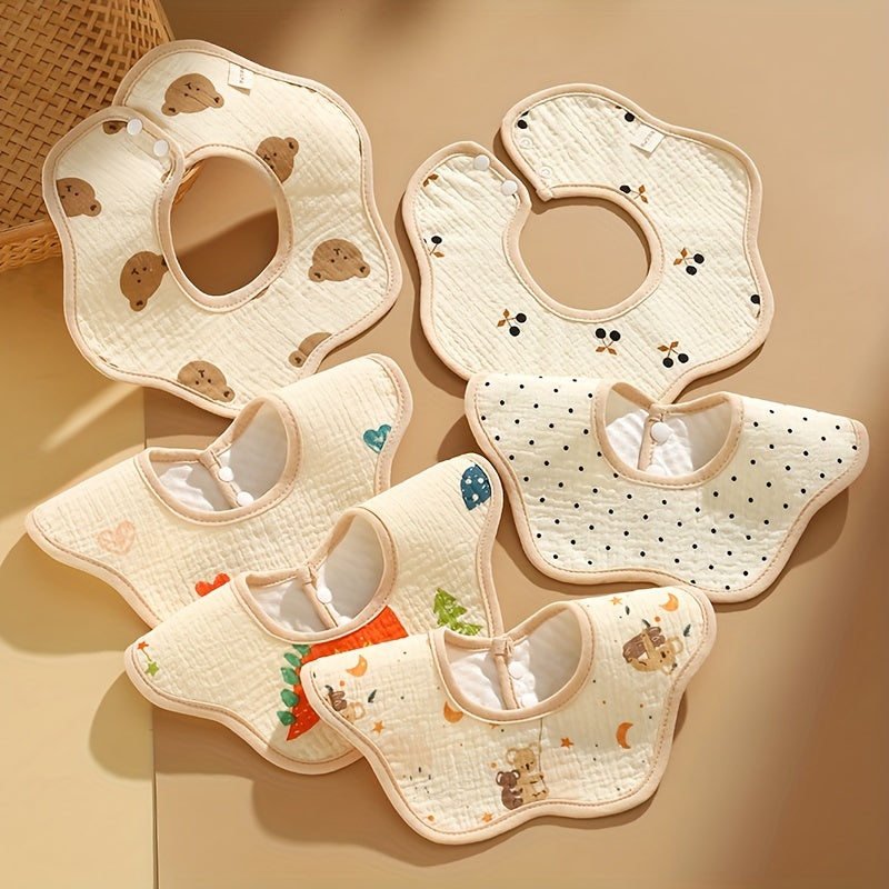 Five-pack of baby bibs made from cotton with a waterproof layer and snap closure. These breathable muslin drool bibs are perfect for newborns and infants aged 0-3 years. Featuring a unisex petal-shaped design.