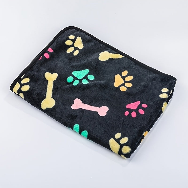 Soft and stain-resistant fleece pet blanket with bone pattern for all sizes of dogs and cats.