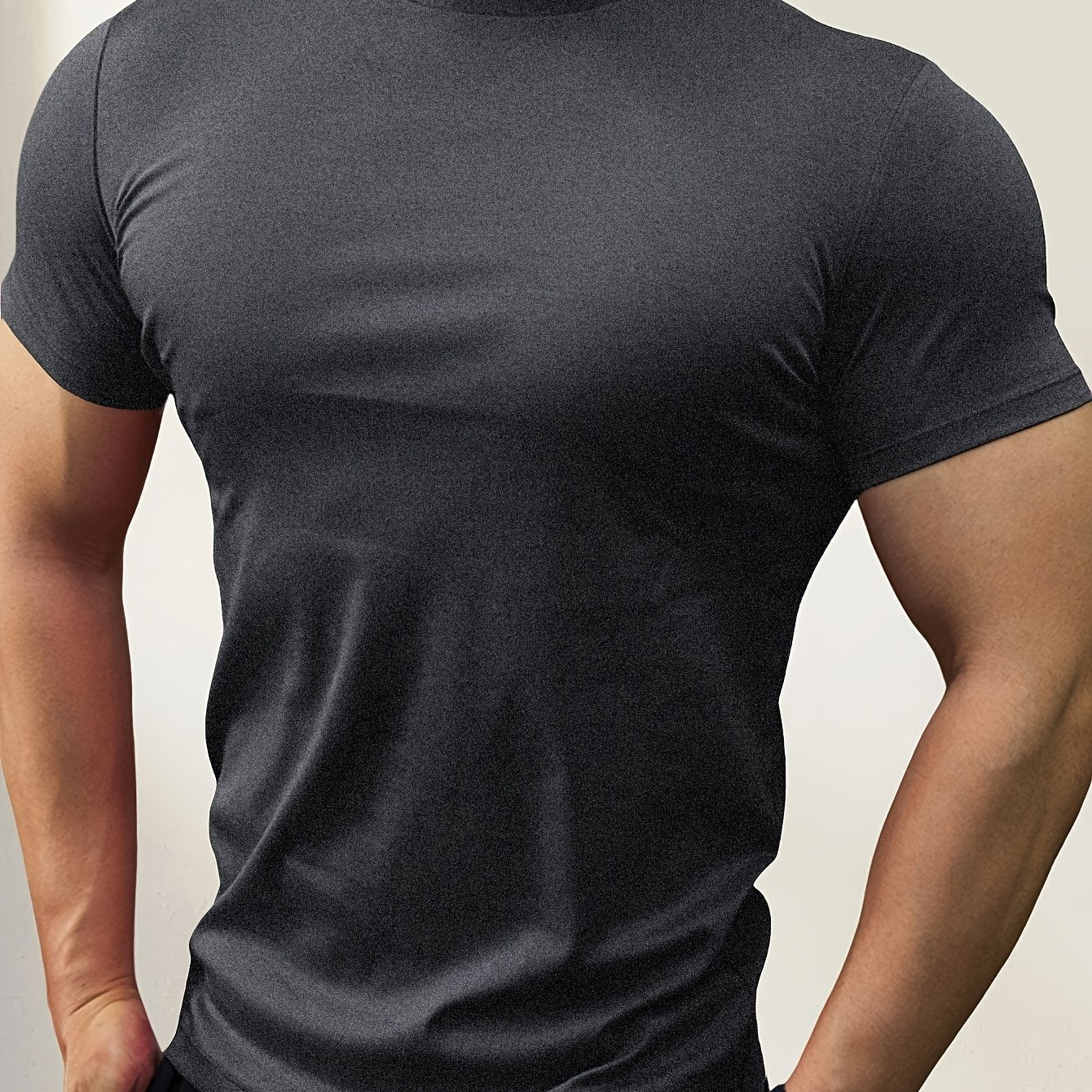 Men's slim-fit short-sleeve t-shirt with stand-up collar, ideal for outdoor activities, gym wear, or layering.