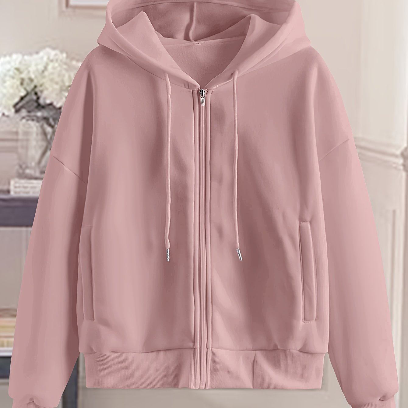 Women's stylish white zip-up hoodie with geometric pattern made of polyester. Machine washable and dry cleanable. Perfect for spring/summer/fall.