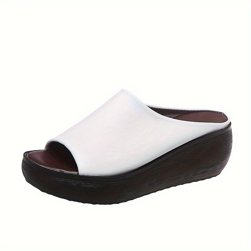 Stylish and comfortable women's wedge slides with open toe and soft sole, perfect for vacations.