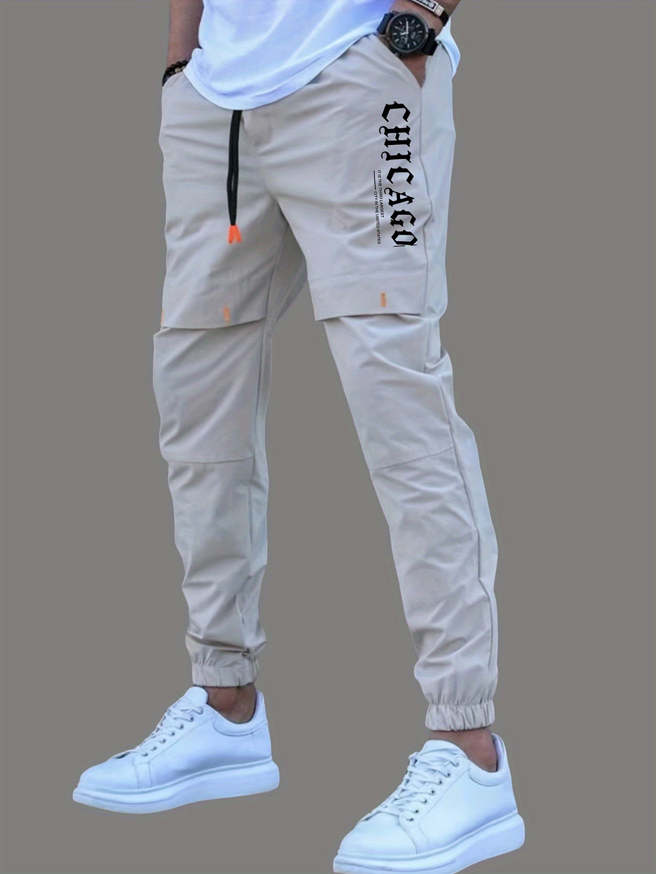 Men's casual joggers made of 100% polyester non-stretch woven fabric with alphabet print detail, suitable for all seasons and featuring a regular fit.