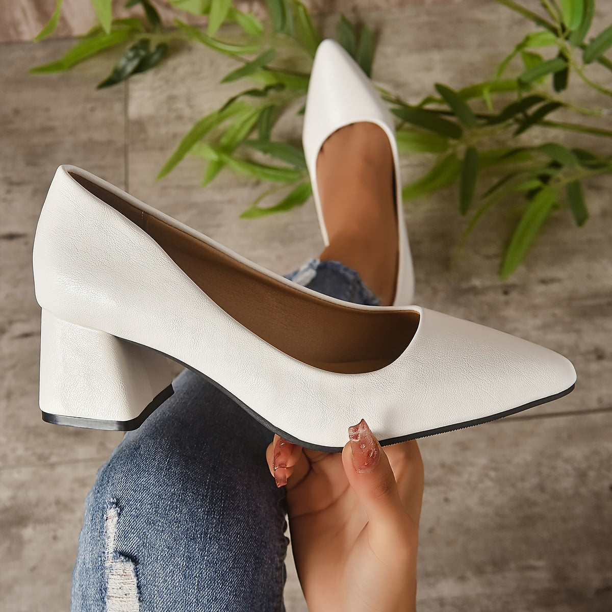 Solid color pumps for women with pointed toe and chunky mid heels, suitable for office work.