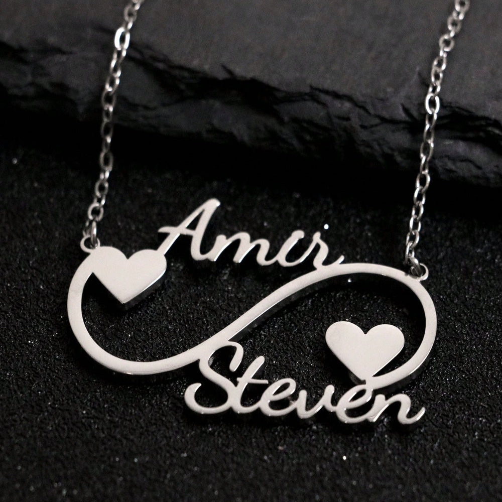 This one-of-a-kind necklace is personalized with two names and features an infinity design, making it perfect for women. Crafted from durable stainless steel, the necklace boasts a unique heart-shaped pendant. With its sleek silver chain, this necklace