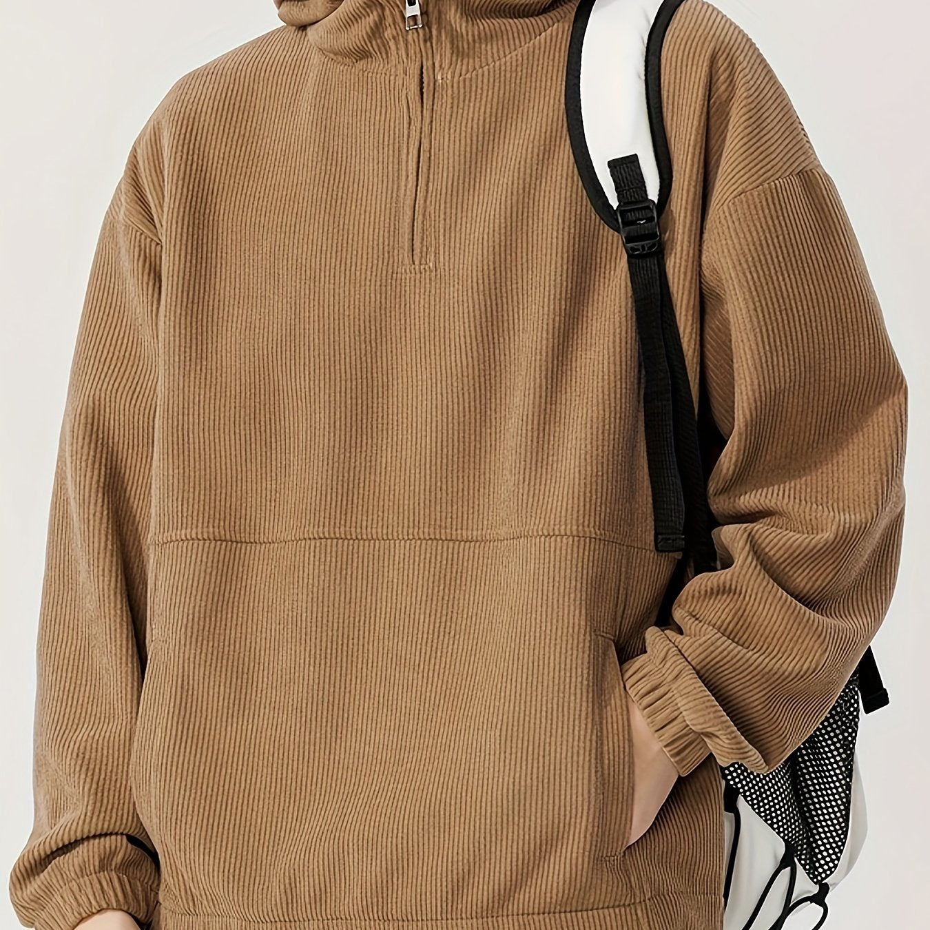 Men's cozy knit zip-up hoodie with dropped shoulder sleeves for casual wear.