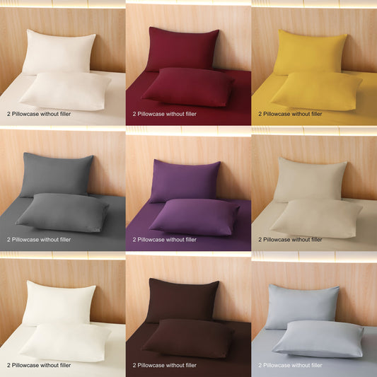 Two pieces of solid color pillowcases made of 90GSM polyester, a must-have for home use. These pillowcases are skin-friendly, comfortable, and have a moderate thickness. They are machine washable and feature a new 2024 style, perfect for all seasons.