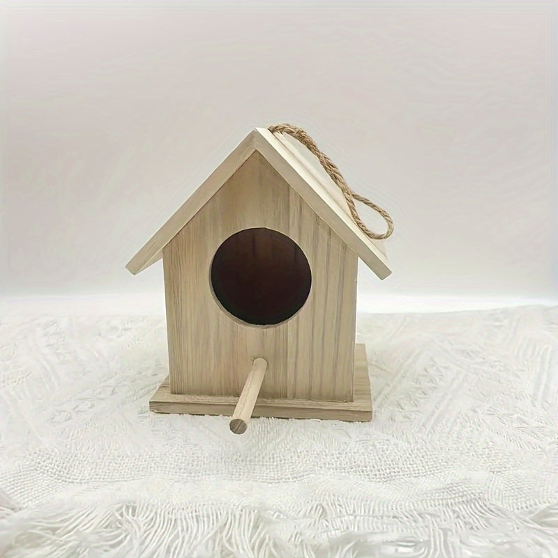 Mini hanging bird feeder made of handcrafted wood, with perch and natural finish, perfect for attracting hummingbirds and small birds in the garden.