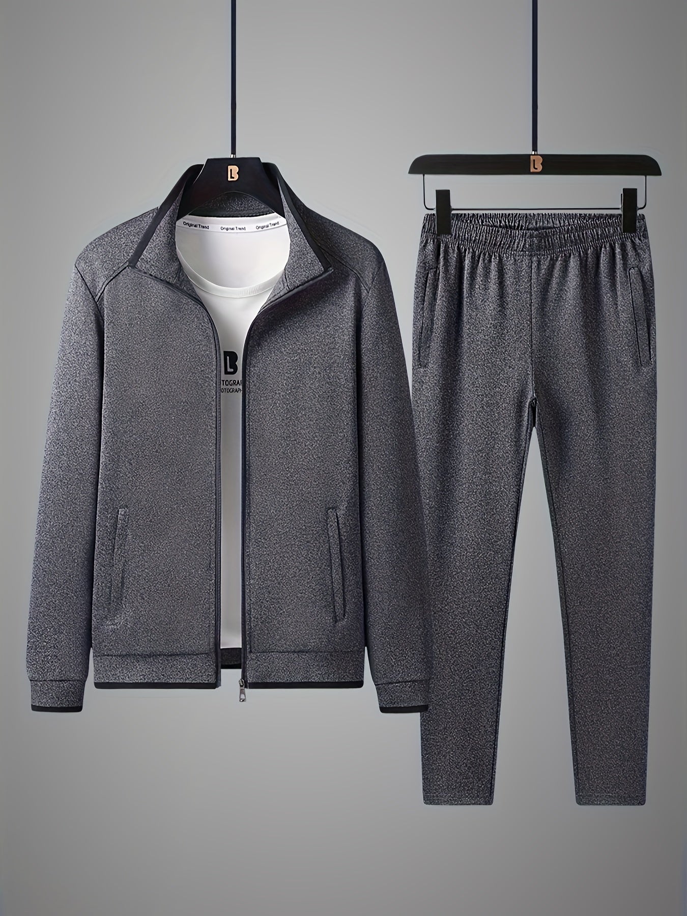 Men's stylish sports outfit sets featuring stand collar zip-up jackets and elastic waist sweatpants, perfect for outdoor casual wear during spring and autumn seasons.