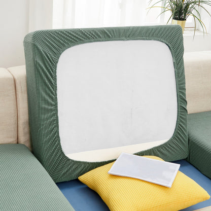 Durable sofa cover protects furniture from spills and stains.