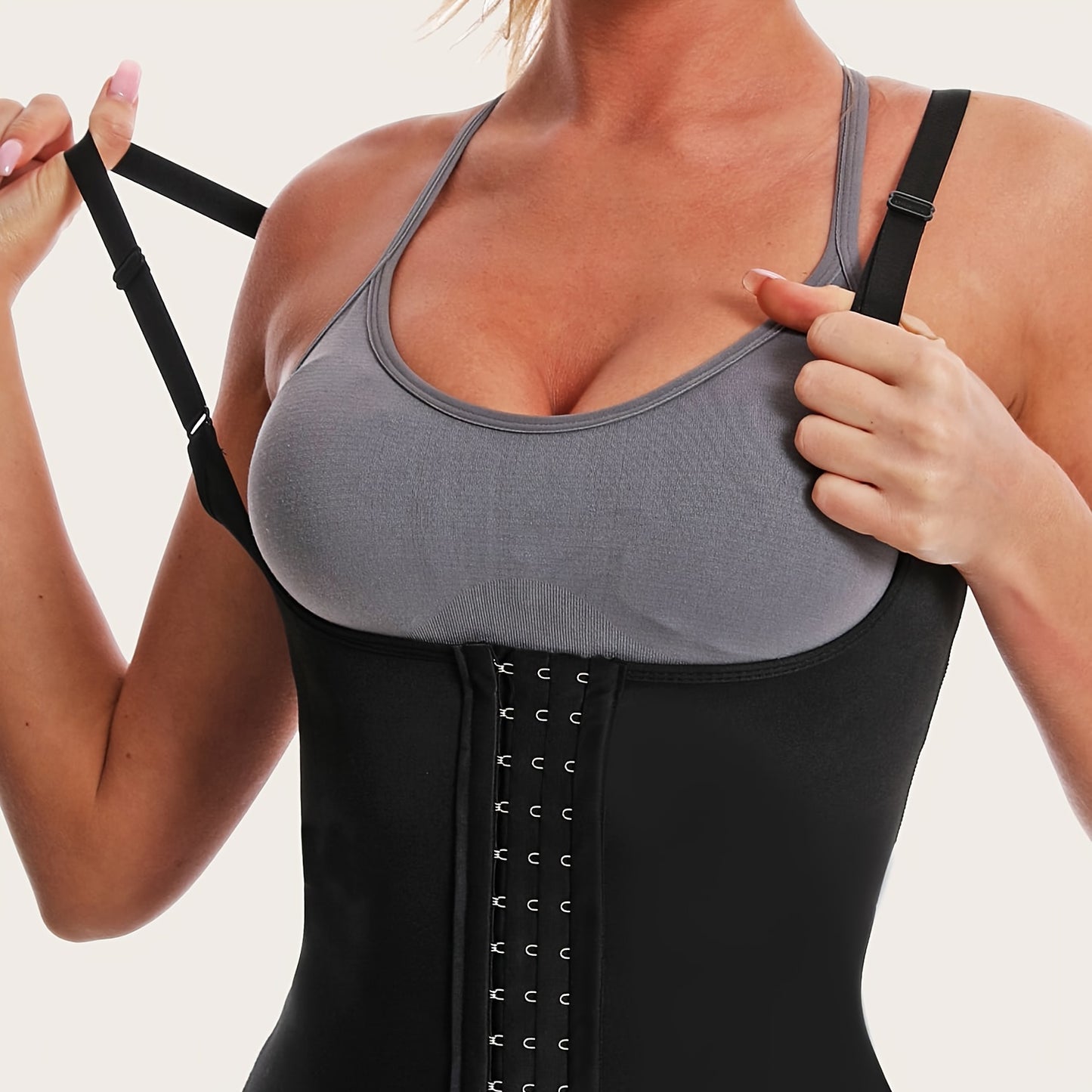 Breathable waist training vest with shoulder strap buckle.