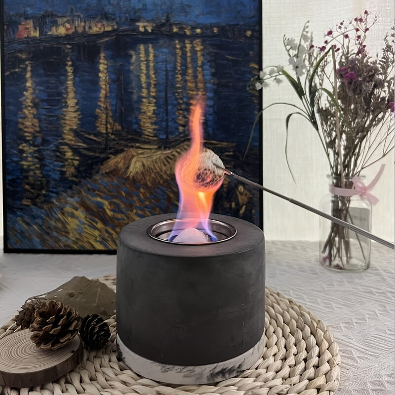 This stainless steel mini alcohol fireplace is a sleek and portable tabletop fire pit, perfect for bringing warmth and ambiance to both indoor and outdoor spaces. At 4.72 inches high and 4.72 inches in diameter, it is ideal for enhancing your patio