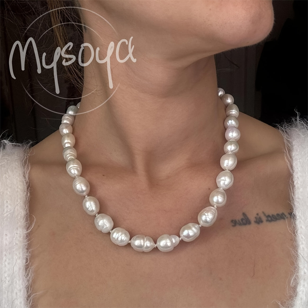 Exquisite handcrafted baroque pearl necklace featuring 10-12mm natural freshwater pearls. This stunning piece of jewelry comes beautifully packaged in a gift box, making it the perfect accessory for both daily wear and special occasions.