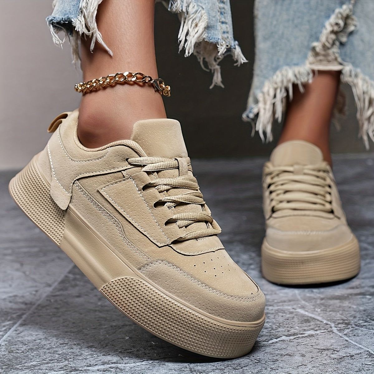 Classic lace-up low top skateboard sneakers for women, with solid color block design and height increase feature. Made with PU upper, fabric inner, and EVA sole for comfort in all seasons.