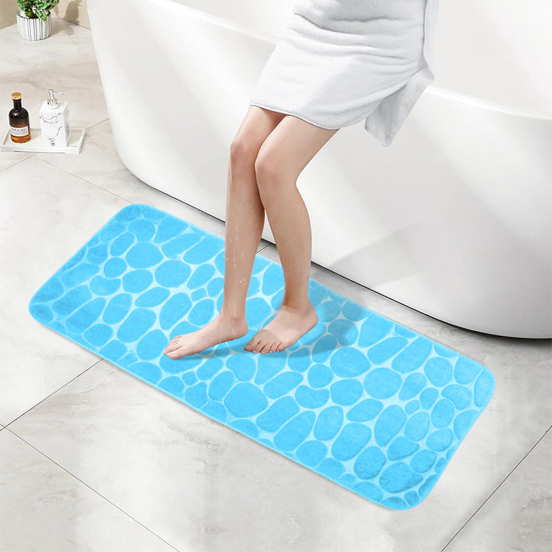 SoftTouch Cobblestone Pattern Memory Foam Bath Mat is machine washable and non-slip, making it a perfect addition to any bathroom. The absorbent polyester material resists stains, making it ideal for use in the bathtub or kitchen. This home decor runner