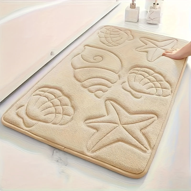 High-density 25D sponge bath mat with ultra-soft starfish and shell embossing, offering super absorbency and non-slip properties. Ideal for bathtubs, showers, and home decor. This bath accessory features high-frequency embossing for a touch of elegance