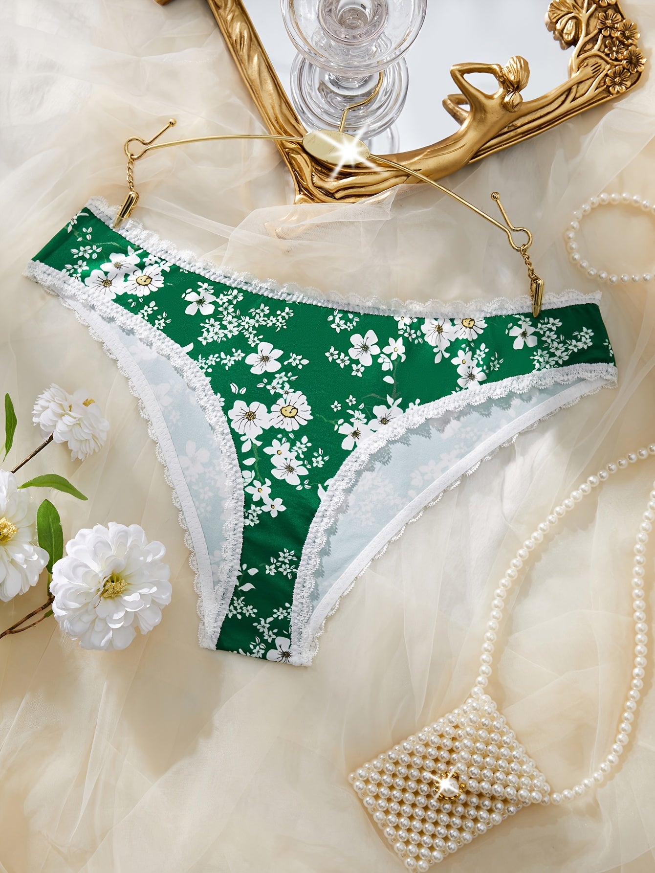 Chic women's floral print lace-trim panties with a delicate touch, mid-rise fit, soft polyester blend, breathable fabric, and non-see-through design - ideal for adults.